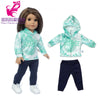 A doll outfit set featuring a light green and white hoodie, matching top, and dark blue pants.