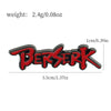 A red enamel lapel pin shaped like the word Berserk with weight 2.4g/0.08oz.