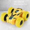 Yellow mini inertia car toy with black wheels and racing-car design