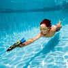 A person swimming underwater with a blue diving torpedo toy.