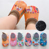 A set of colorful baby barefoot water shoes for beach and outdoor play shown on a hand and various sizes.