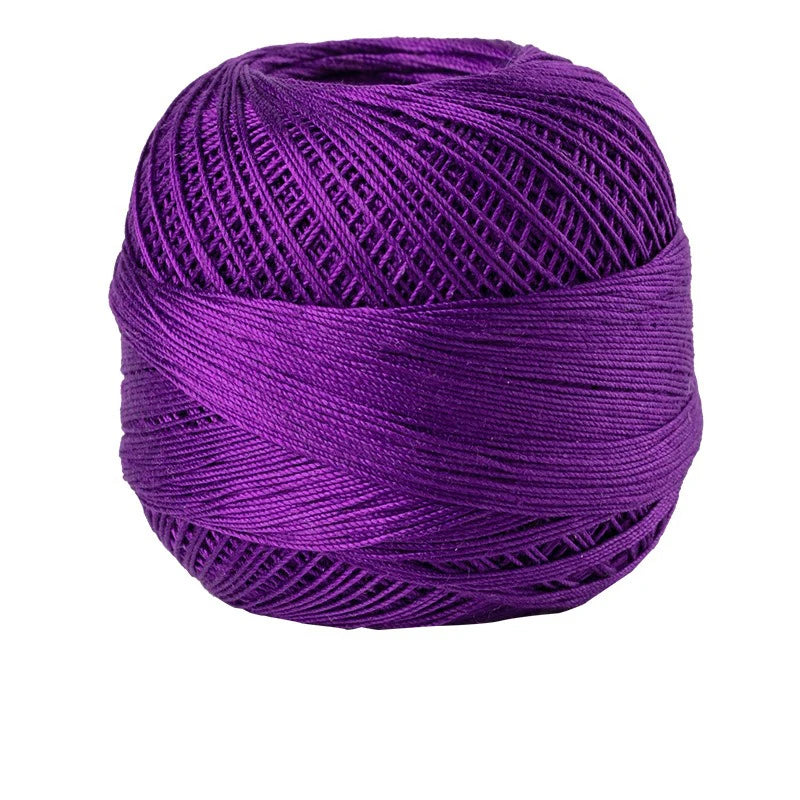 Purple crochet thread for tatting and embroidery, tightly wound on a spool.