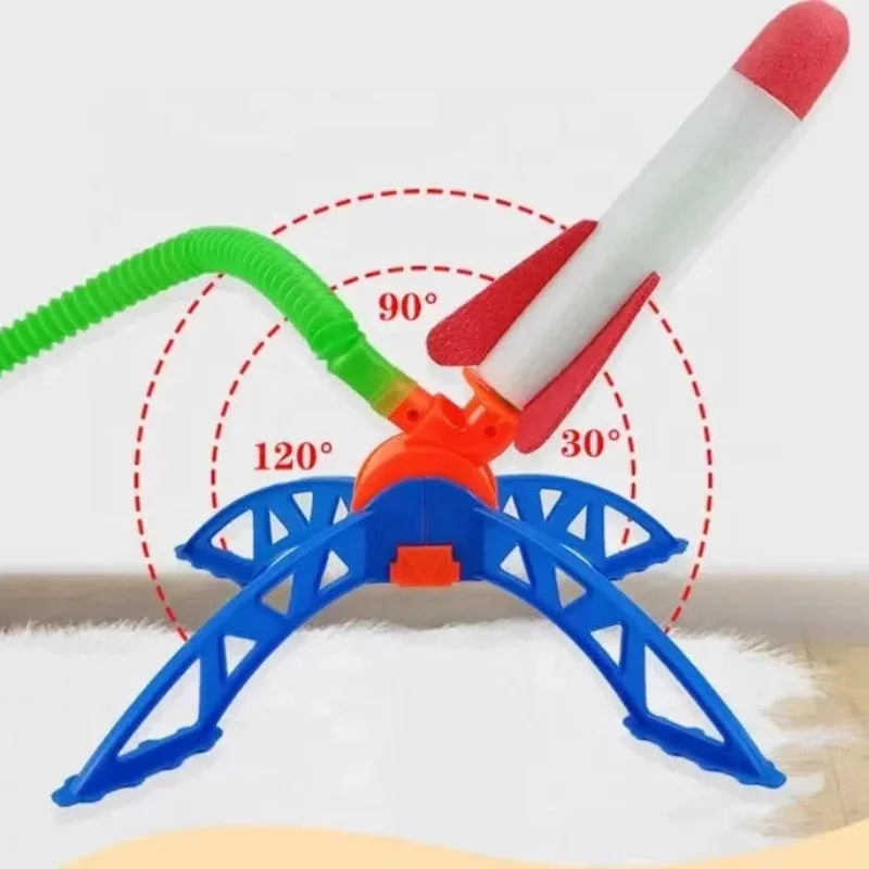 A white and red air-powered stomp rocket launcher with a green tube, demonstrating 90 and 120 degree angles.