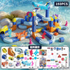 A magnetic anti-gravity train building set featuring blue and orange track pieces and various accessories on a beach backgrou