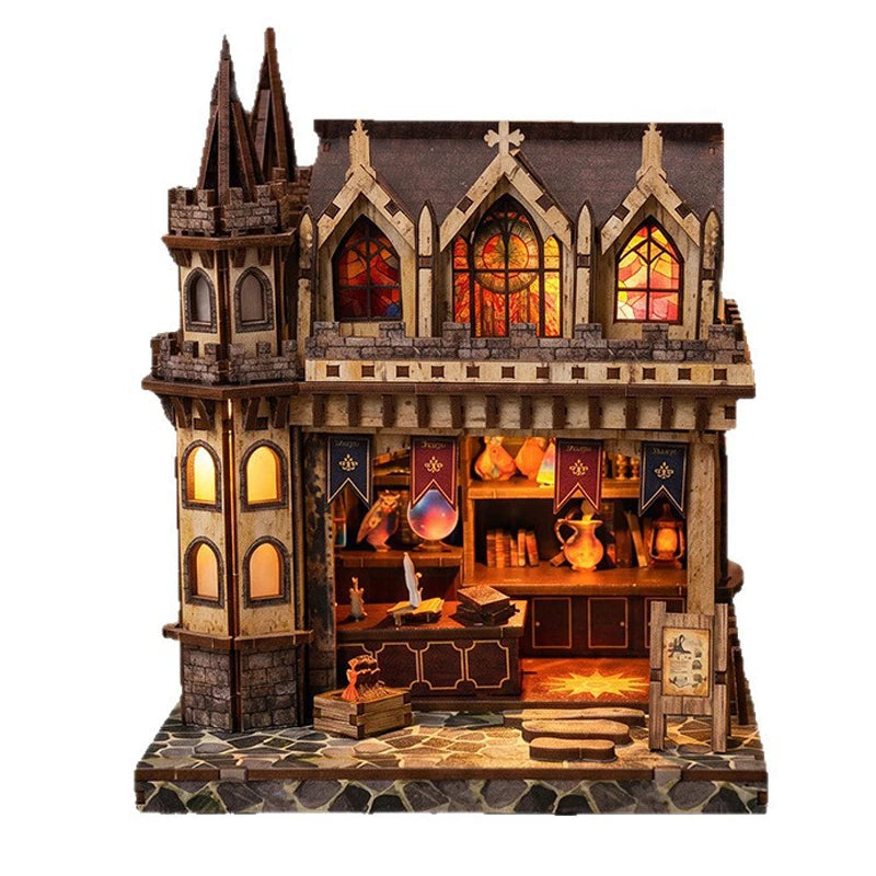 A detailed miniature kit of a wooden magic store cottage featuring architectural details and furniture.