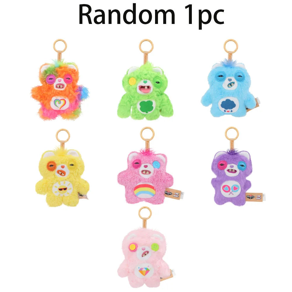 Random plush keychain charms in various colors including orange green blue yellow pink and purple