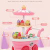 A pink ice cream truck pretend play set with various foods and accessories on a light pink surface.