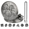 A silver steampunk dragon pocket watch dice case with seven small dice.