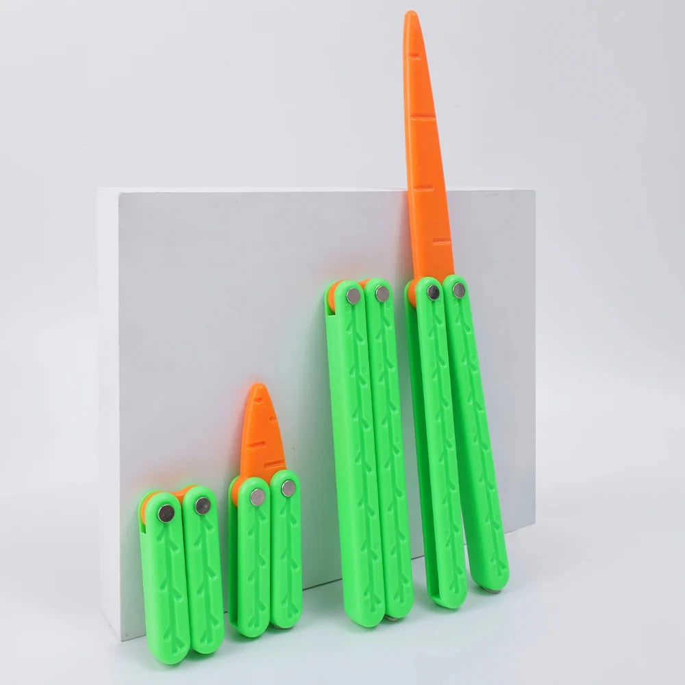 A set of orange and green 3D printed butterfly knife fidget toys for stress relief
