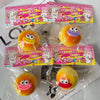 A collection of squishy toys shaped like steamed bread, featuring various colors and characters.