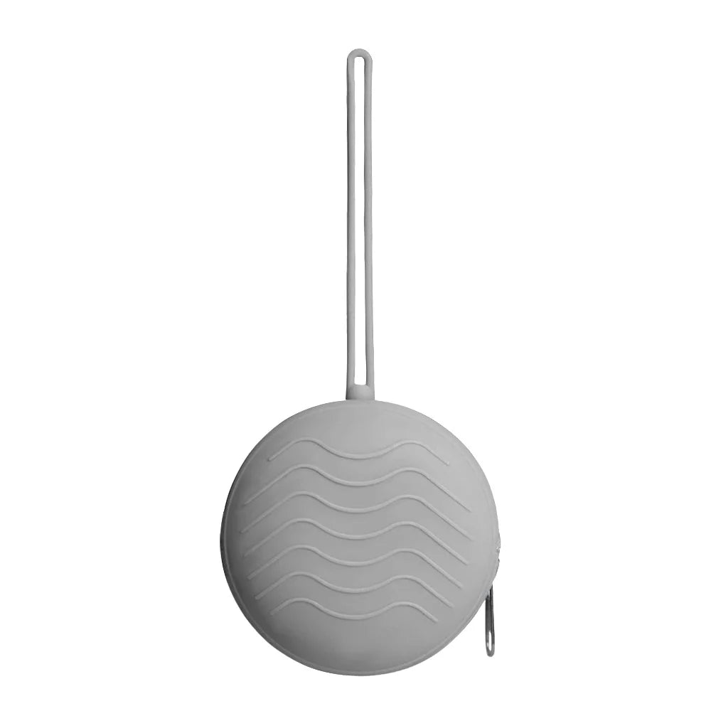 A white silicone pacifier holder with a long bar and a round soothing case.