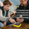 A man and a boy play a handheld electronic tic tac toe game outdoors on a wooden table.