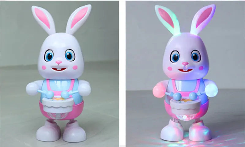 A white and pink musical robot rabbit toy with large ears, standing on its feet.