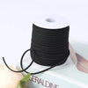 Roll of black velvet faux suede braided ribbon for crafting and gift wrapping