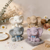 Three small elephant silicone molds in various shades of gray and lavender used for crafting.