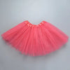 A bright pink three-layer tutu skirt for girls displayed against a light gray background.
