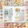 A page from a vintage embroidery sticker book showing various delicate stickers and illustrations for journaling