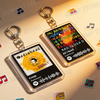 A clear acrylic keychain featuring a yellow flower design and the word Radiohead on it.
