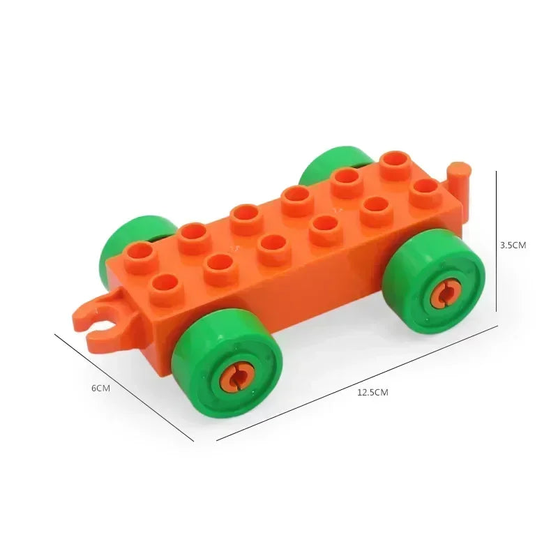 Orange plastic building blocks shaped like a vehicle with green wheels and orange accents.