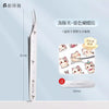 A pair of silver precision stainless steel tweezers for crafting, shown next to various small stickers.