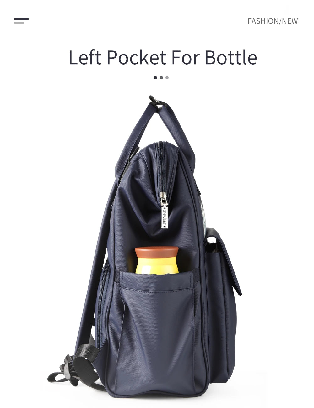 Navy waterproof diaper backpack featuring a dedicated left pocket for bottles.