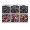 A clear plastic container filled with various colors of crushed glass stones for resin and craft projects.
