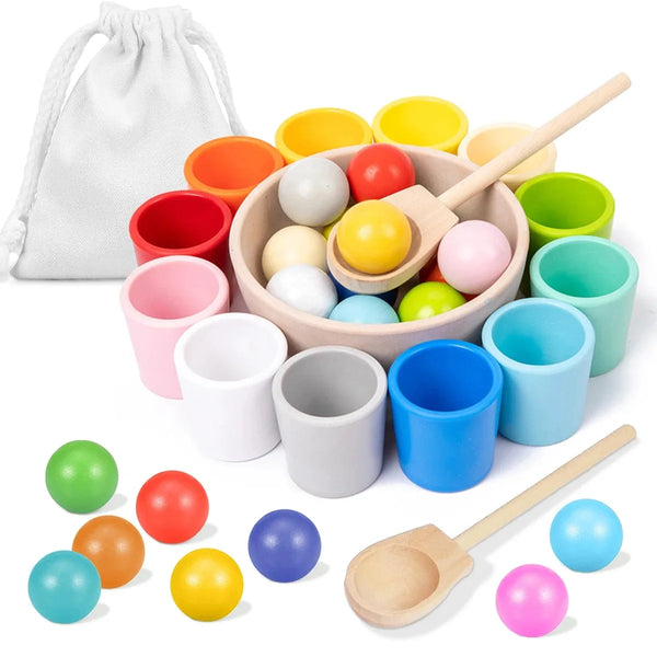 A collection of colorful wooden sorting balls and a wooden spoon for fine motor skill development.