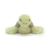 A soft, light green simulated turtle plush doll with a gentle expression.