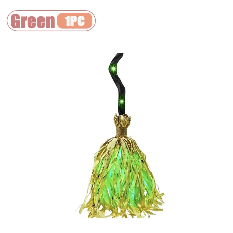 Animated witch broom with a green LED glow and sound effect