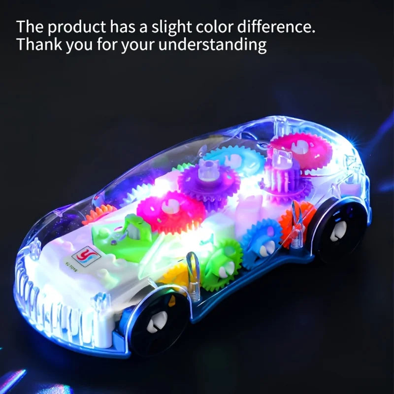 A clear plastic stunt car with rotating lights and colorful gears is shown on a dark surface.