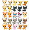 A collection of various Littlest Pet Shop style standing dog figures in different colors and patterns.