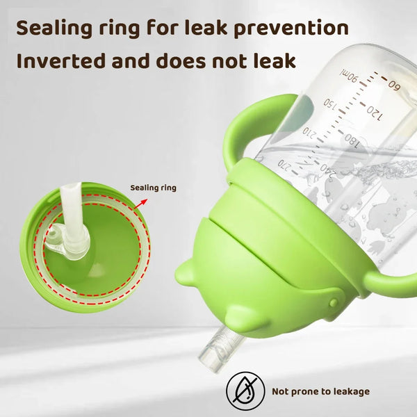 A green silicone sealing ring for leak prevention shown with a baby straw cup.
