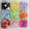A collection of mixed acrylic loose beads in various colors and shapes for jewelry making.