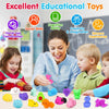 A woman is playing with various colorful squishy fidget toys and sensory items with young children.