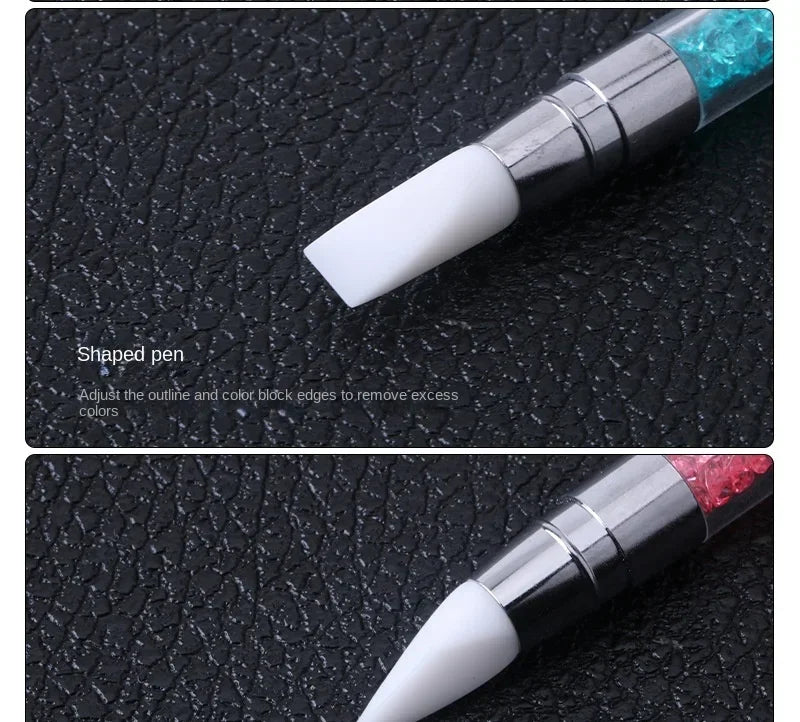 A shaped dual-ended silicone pen with a crystal blue head is shown against a black leather background.
