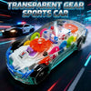 A transparent gear sports car model with internal components and lights displayed on a dark surface.