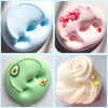 A collection of slime products including a clear blue slime, pink slime, green slime, and white whipped cream slime.