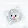 A clear squishy bubble squid stress relief toy packaged in a plastic bag.
