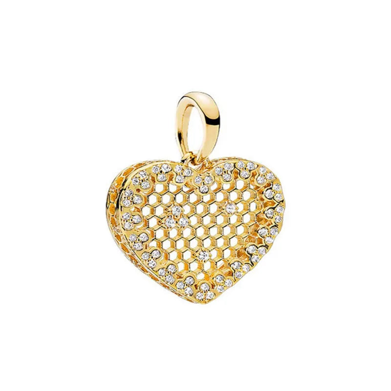 Gold heart pendant charm bracelet featuring elephant, key, butterfly, and heart pendants