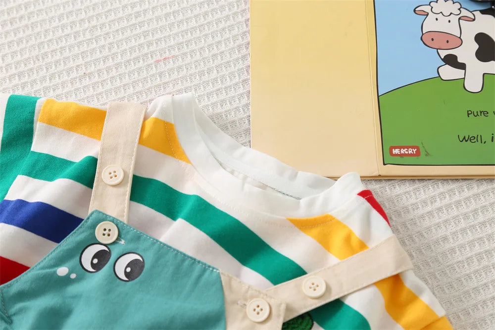 A striped dinosaur two-piece outfit set featuring white, yellow, and green stripes on a light background.