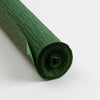 A roll of dark green crepe paper for DIY crafts and gift wrapping.