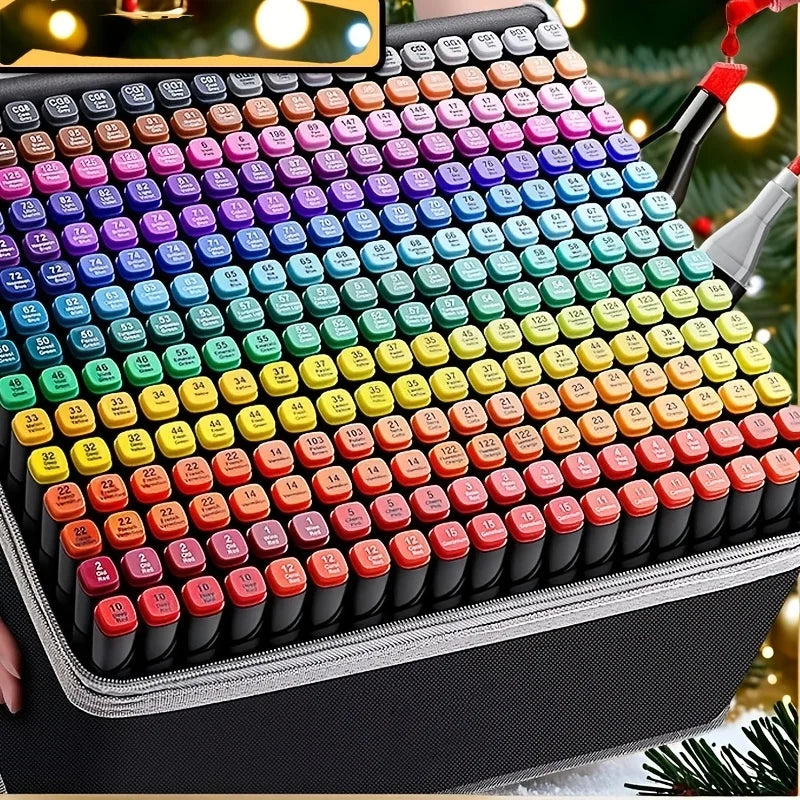 A close-up view of a large set of 12 color permanent art markers arranged in a grid inside a black case.