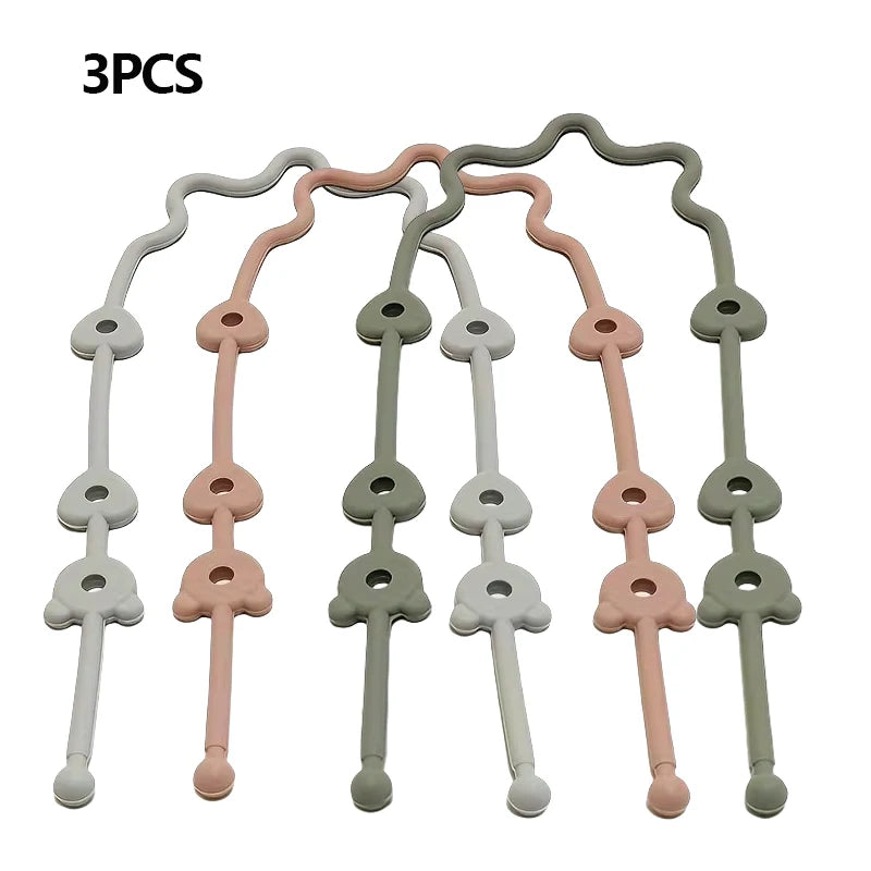 Three silicone pacifier clips with anti-drop chains in various pastel colors