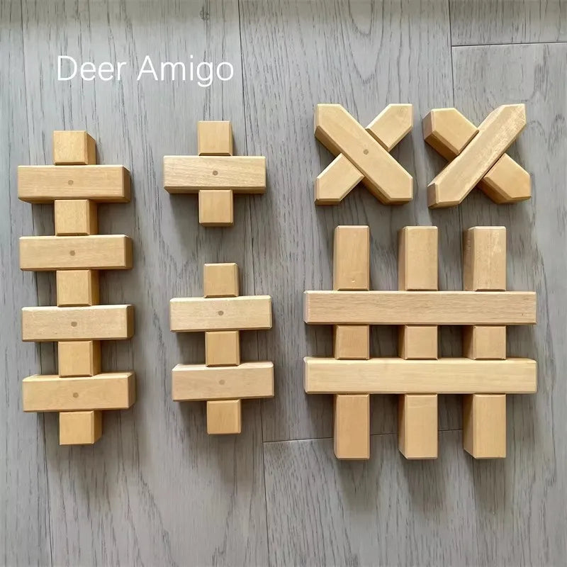 Wooden building blocks shaped like an X and a hash symbol for creative play