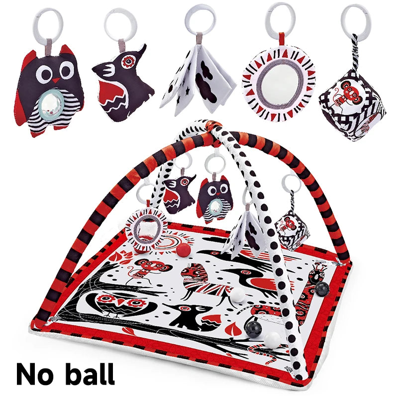 A multifunctional baby play mat with a fitness frame and hanging toys featuring various animal shapes.
