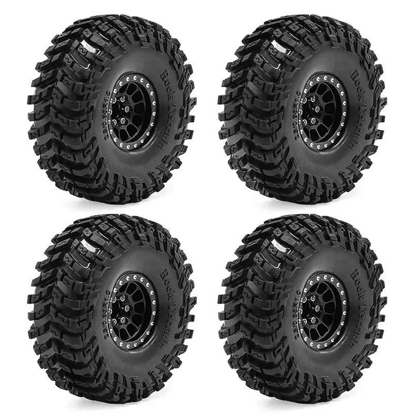 Four views of a black metal beadlock wheel tire set for RC crawlers