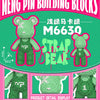 A green kawaii bear figure made of pink building blocks, displayed with product details.