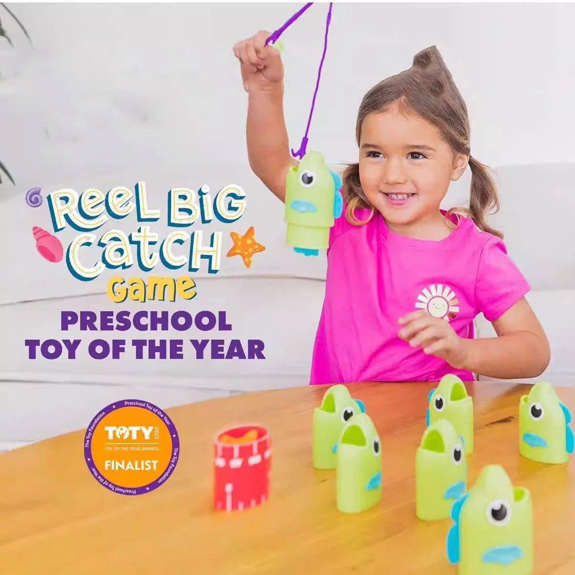 A young girl is playing the Reel Big Catch game with green and yellow fishing rods and lures on a wooden table.