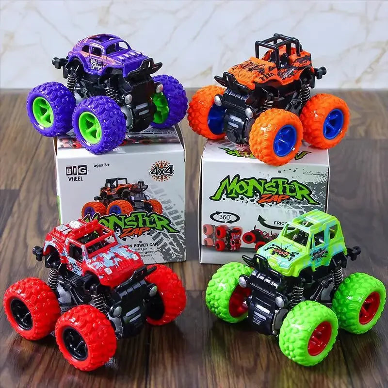 Three Monster Zap friction-powered toy monster trucks in purple, orange, and green on display boxes.
