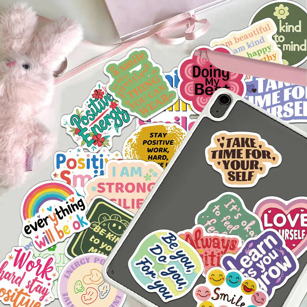A collection of colorful positive affirmation stickers for laptops, notebooks, and phone cases.